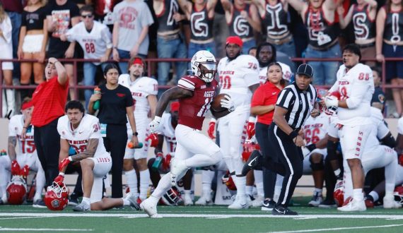 NMSU Larenzo McMillan running in for 84-yard touchdown