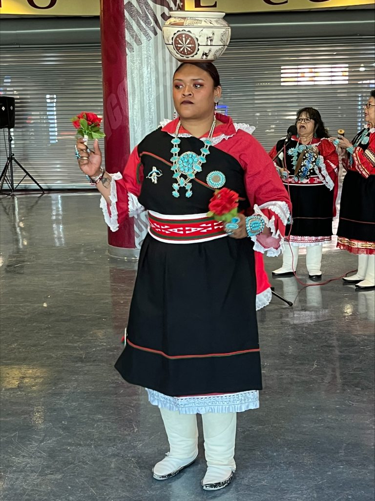 Zuni Olla Maidens dance with fitted pots on their heads.